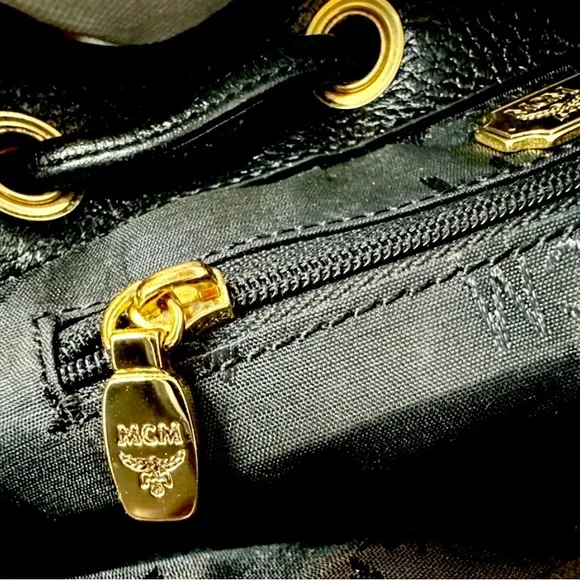 MCM Gold Studded Logo Black Pebbled Leather Backpack Tasseled Drawstring - Picture 12 of 15